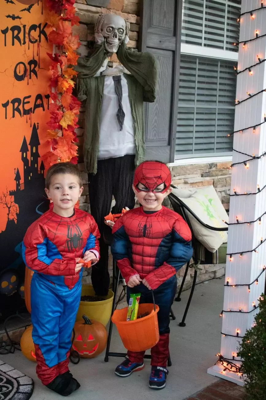 Neighborhood comes together to give young boy a memorable trick-or-treat birthday